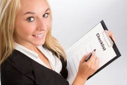 woman-holding-a-checklist-image-from-shutterstock