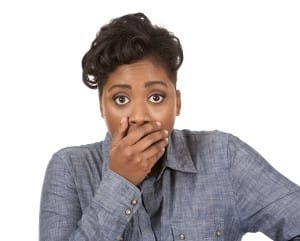horrified-woman-covering-mouth-image-from-shutterstock
