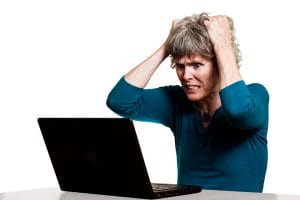 frustrated-woman-in-front-of-computer-image-from-shutterstock