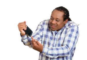 man-holding-smartphone-gesturing-image-from-shutterstock