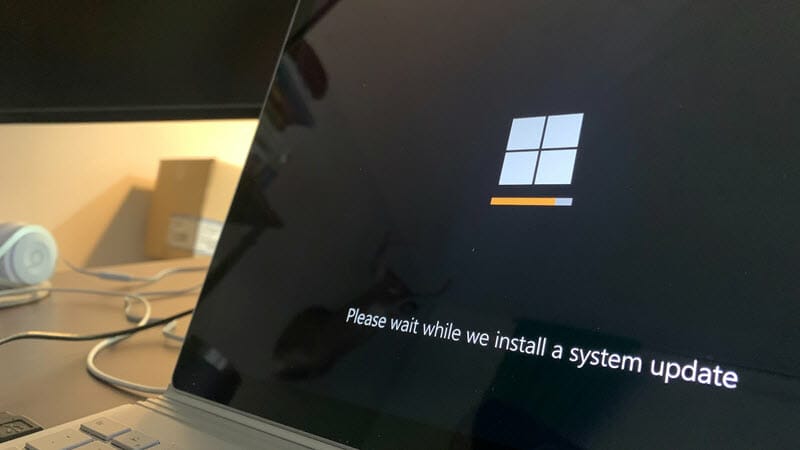 A laptop undergoing a system update.
Caption: It will be much more difficult for hackers to find an exploit if you keep all of your software and systems up to date. - image licensed from unsplash.com